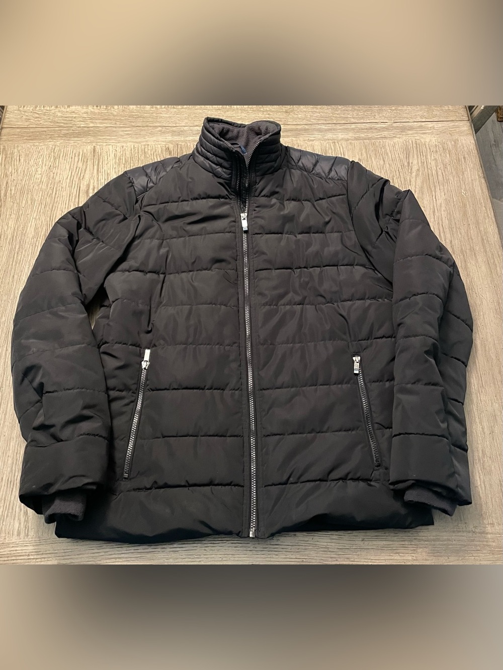 Weatherproof men’s coat, medium, black, inside and outside pockets.